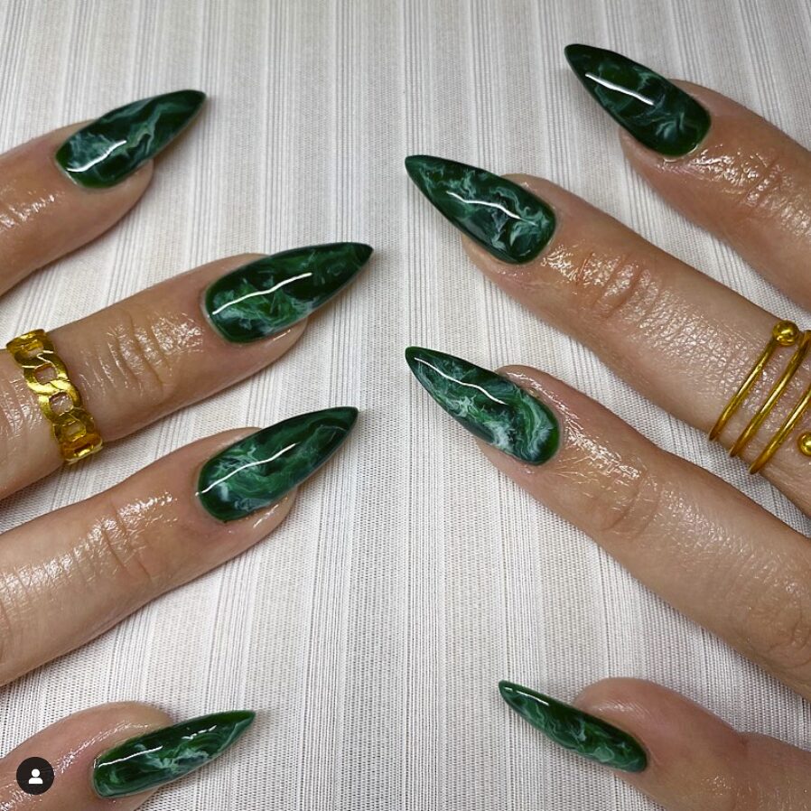 Stiletto Marble Nails in green color with white veins