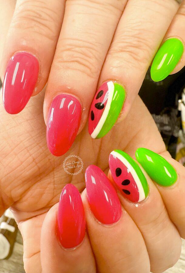 Pink and green nails with watermelon slice accent designs