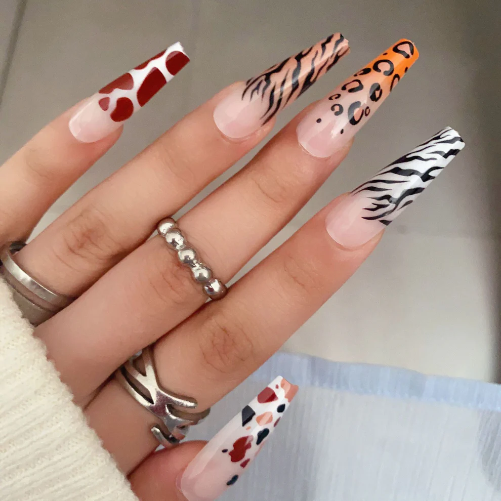 coffin nails with mixed animal print designs