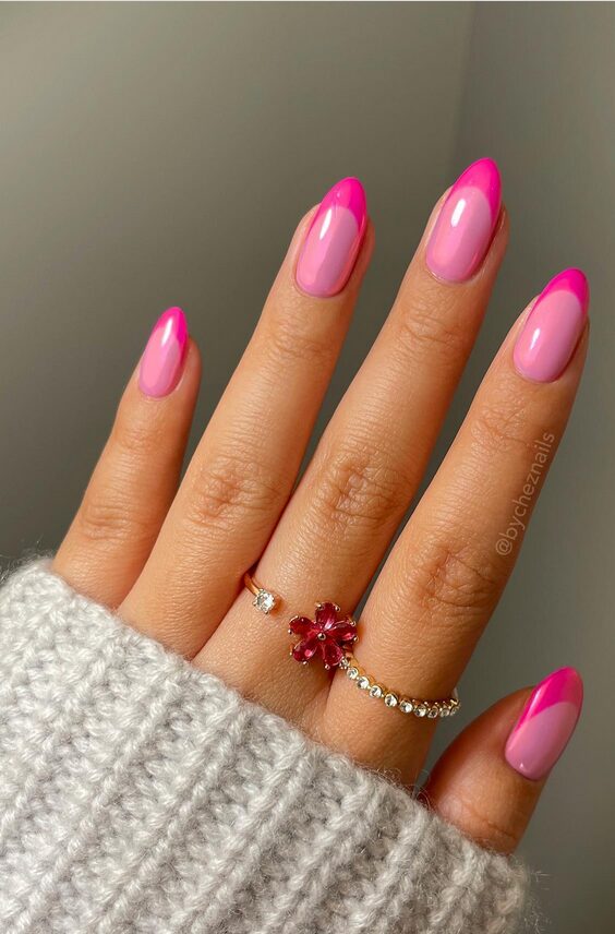 Pink almond nails with bright neon pink French tips