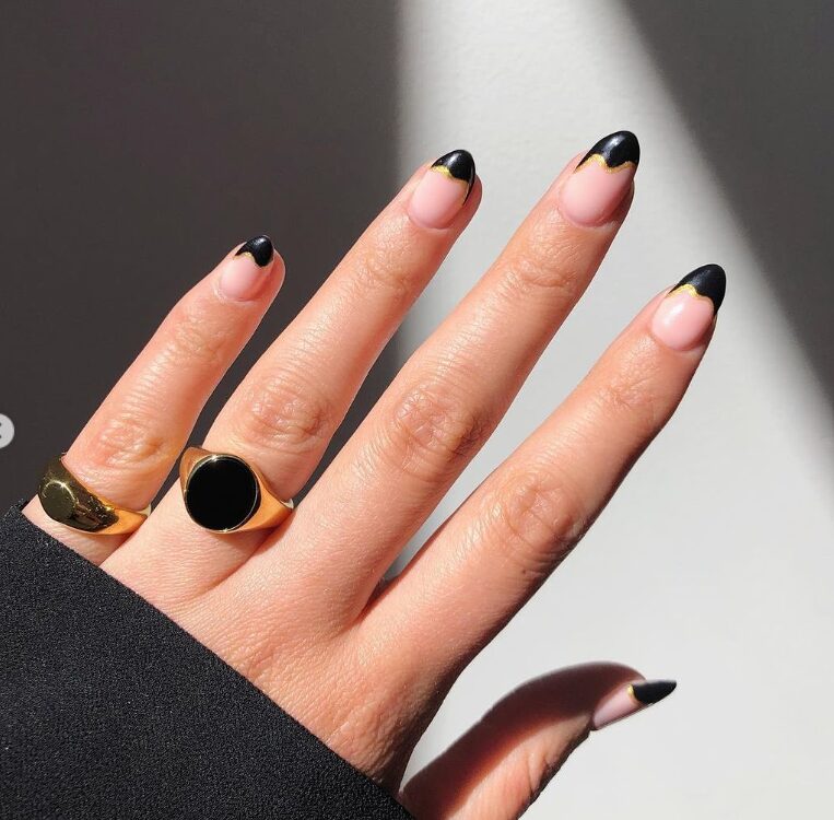 black french tip nails with gold lines