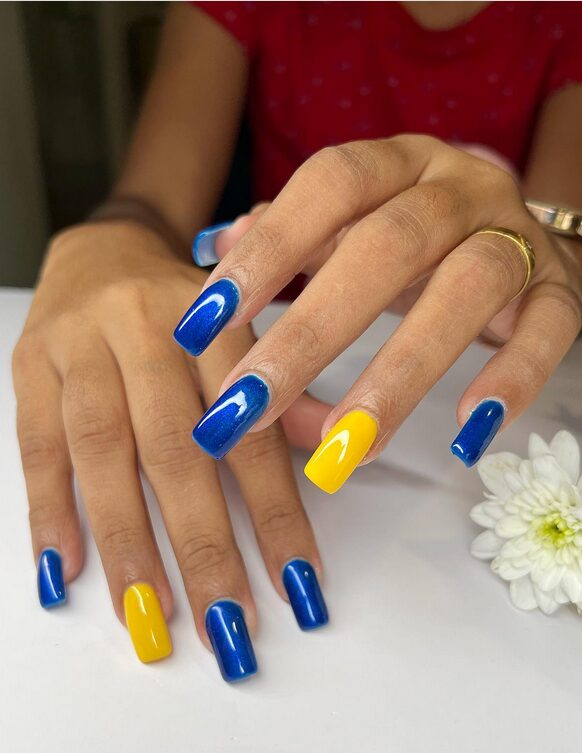 Navy blue nails with yellow mix and match
