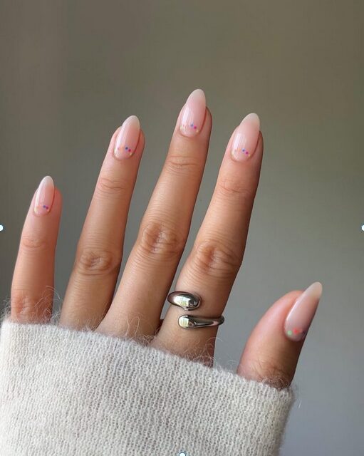 Half-Moon Dot nail art on nude base