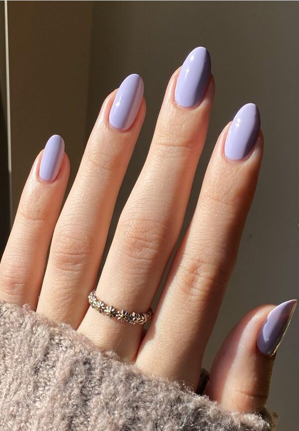 bright lavender neon nails closeup