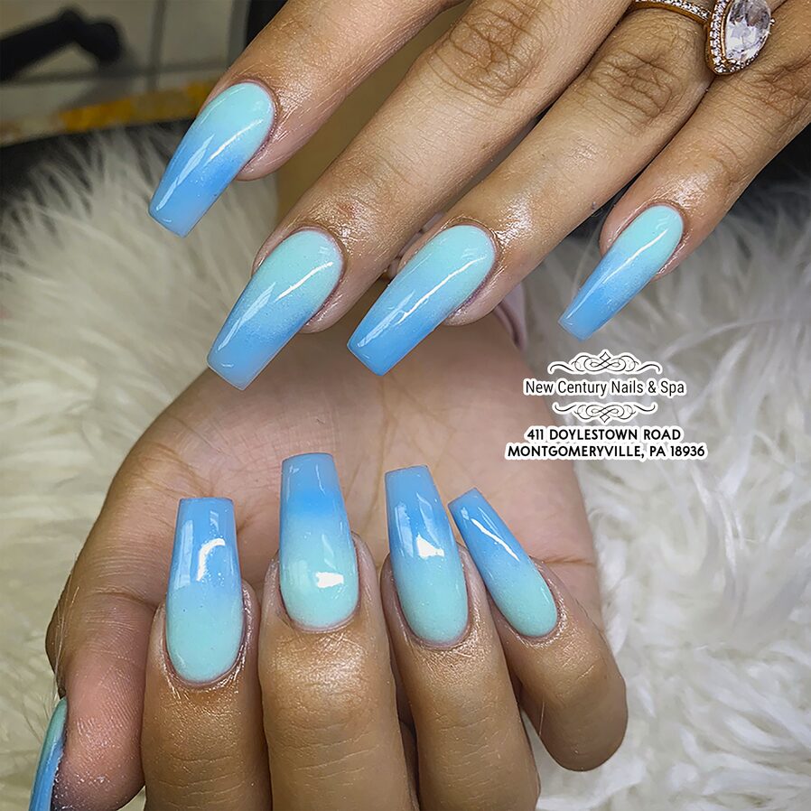 long coffin nails with glossy sky blue ombre