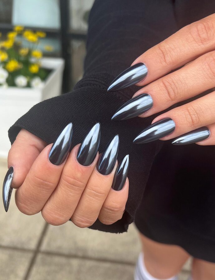 midnight black chrome nails closeup