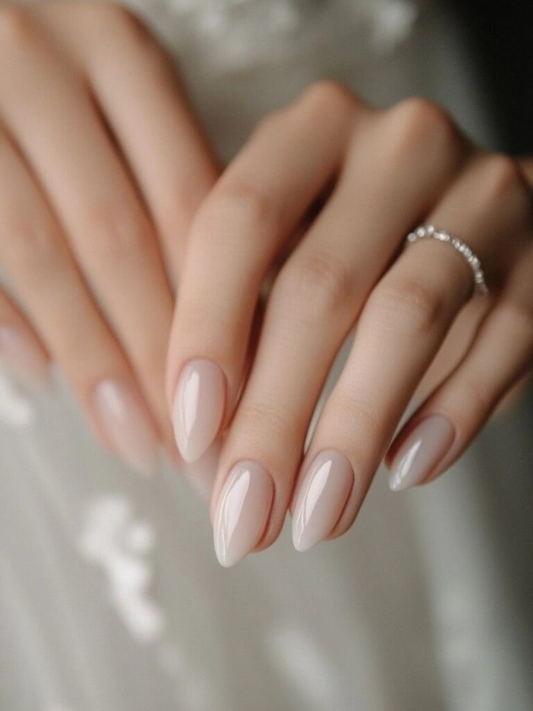 milky nude almond nails