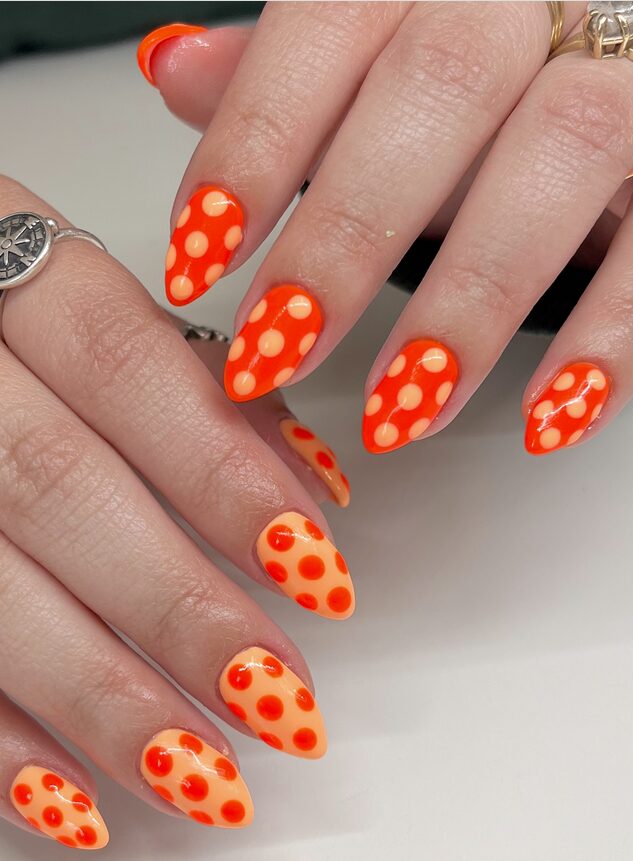 Orange nails with big dots