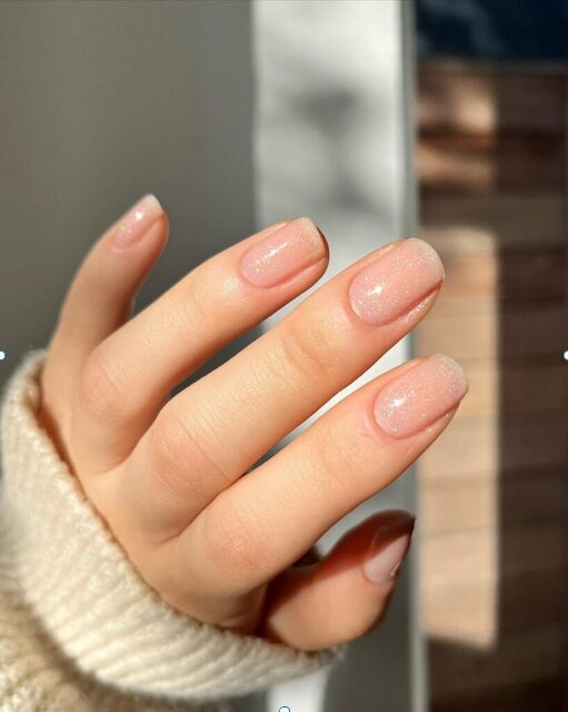 short sheer glitter on nude nails