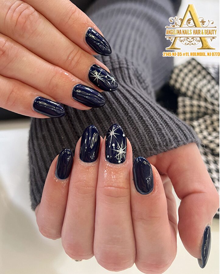 Navy blue nails with tiny white stars