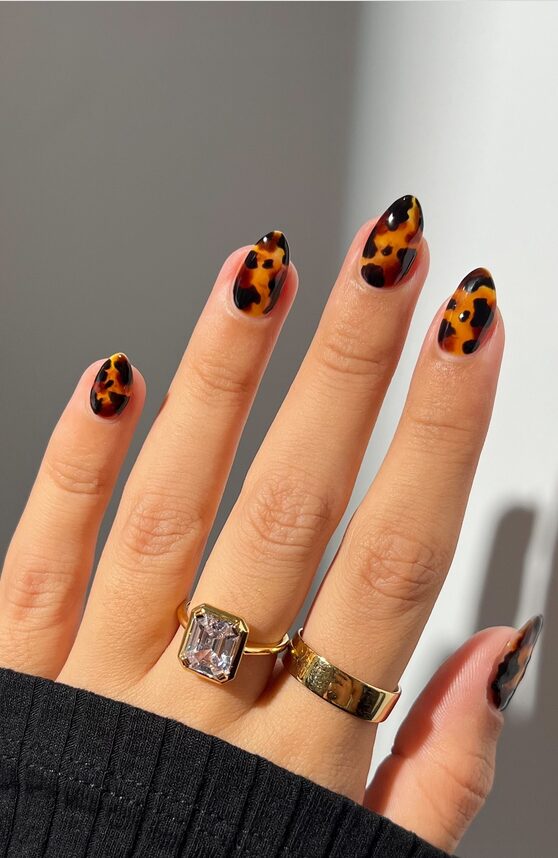 short and sweet tortoise shell nails