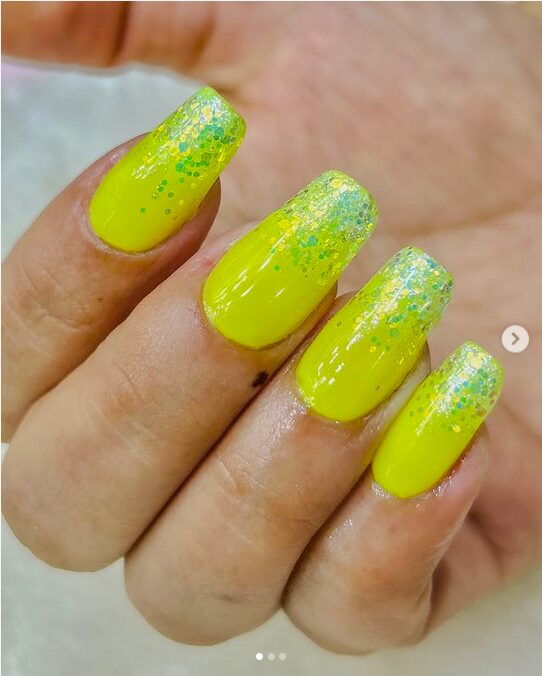 Neon yellow nails with glitter ombre tips
