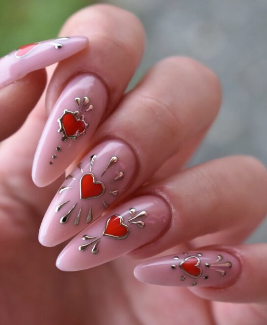 glossy nude nails with raised 3D hearts