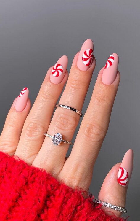 red & pink Peppermint Swirl nails