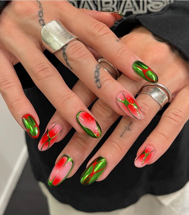red and green airbrushed aura nails