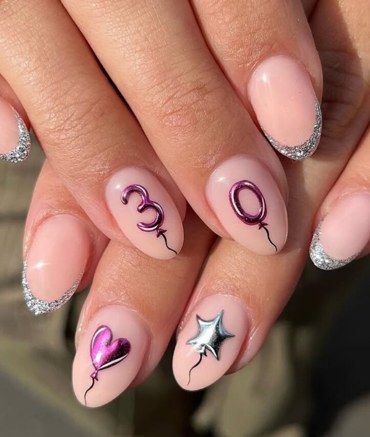 pink birthday nails with metallic balloon designs