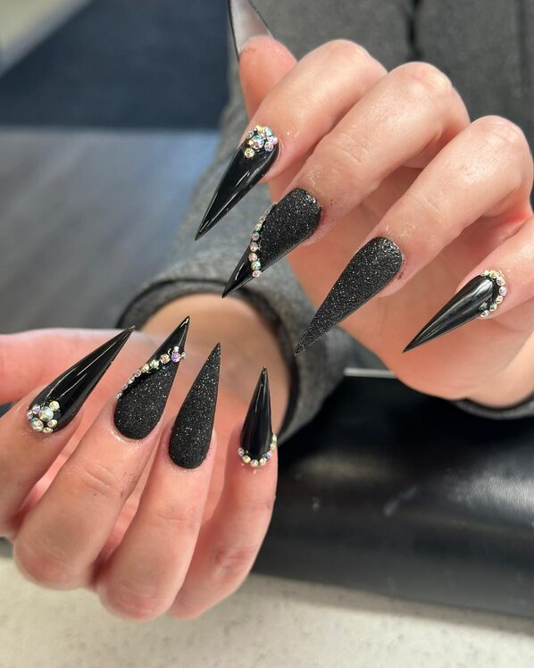 Black with gold accents stiletto nails
