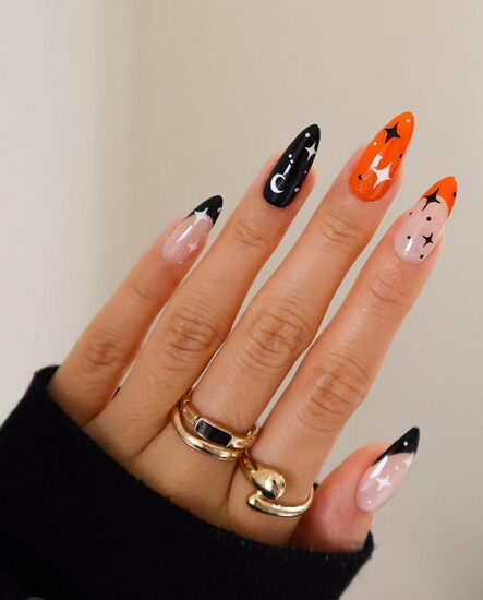 Black and orange Halloween nails with glossy finish