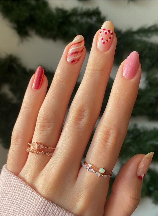 red & white mix-and-match nails with striped and French tip combinations.