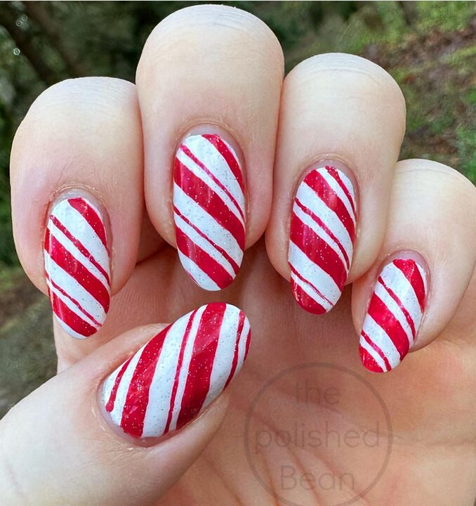 nails with candy cane stripes in red and white