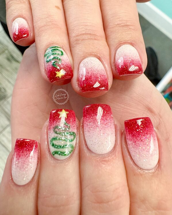 ombre Christmas nails blending red and white shades
