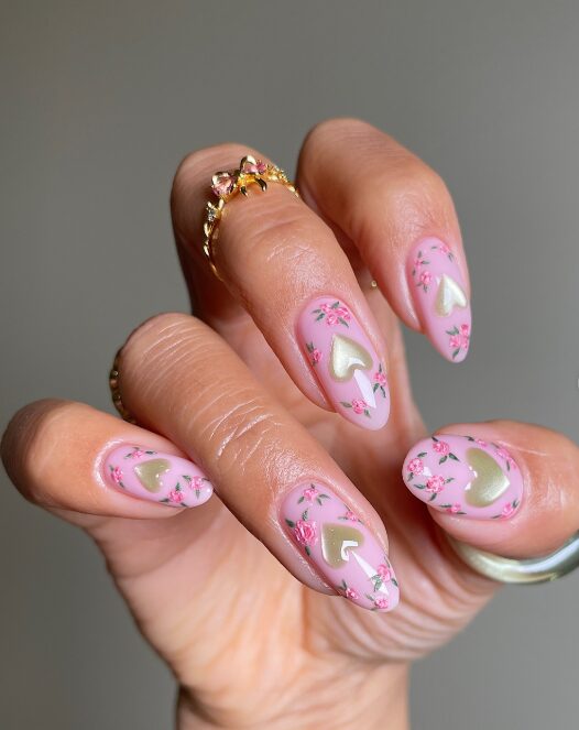 pastel nails with heart shapes filled with floral patterns