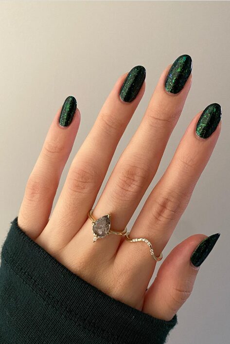 Dark green glossy nails