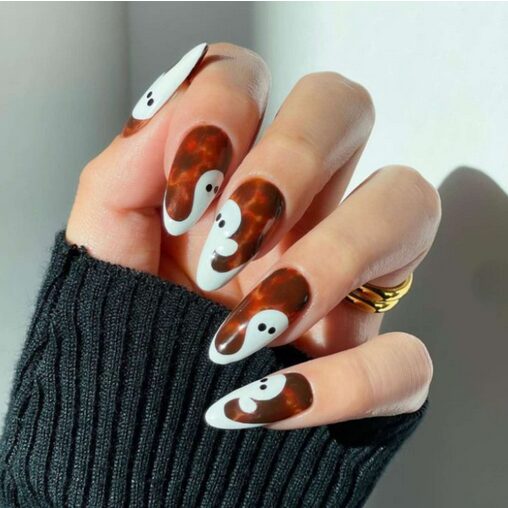 Tortie nails with white ghost accent nail art