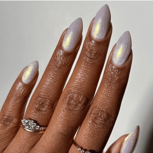 Sheer winter nails with silver glitter