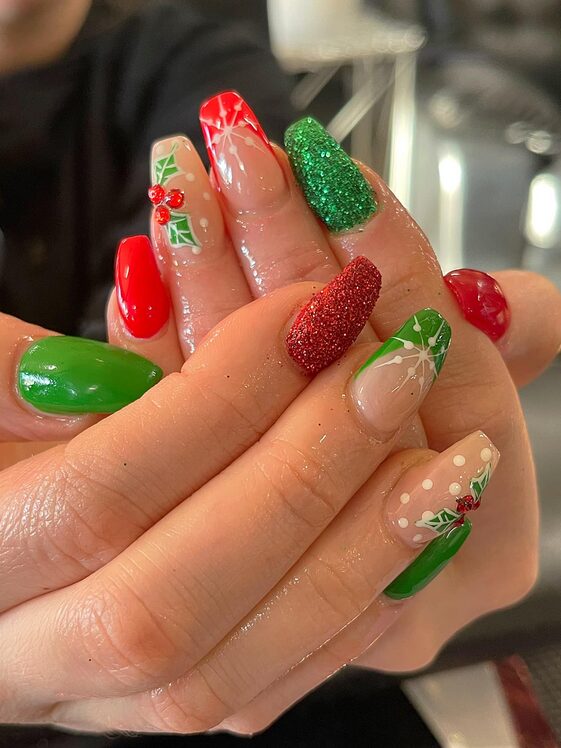 nail designs featuring green polish, red and gold glitter