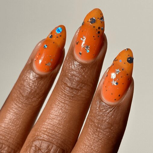glassy bright orange nails