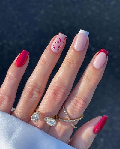 bright red accent nails with shimmer