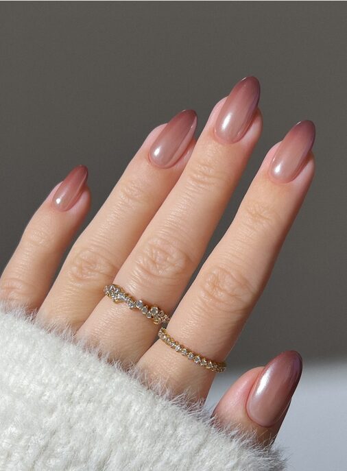 Latte ombre nails fading from beige to mocha