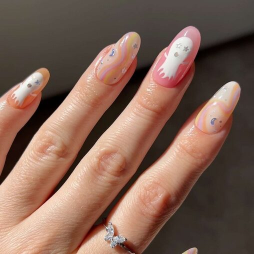 pastel color nails for halloween with ghosts accents