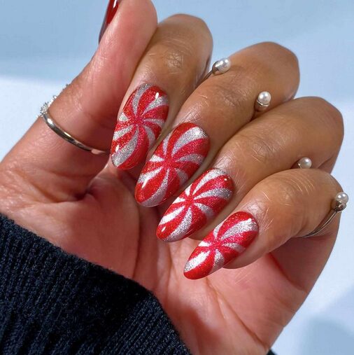 nails with red-and-white peppermint swirls