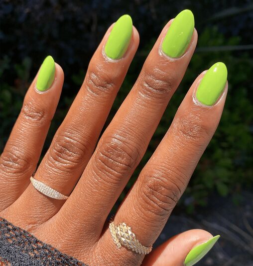 Plain Grinch green nails with a smooth, glossy finish