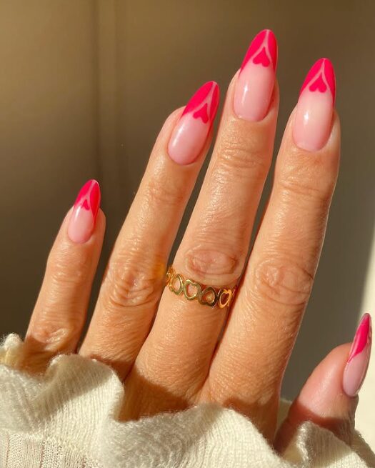 pink nails with heart-shaped tips