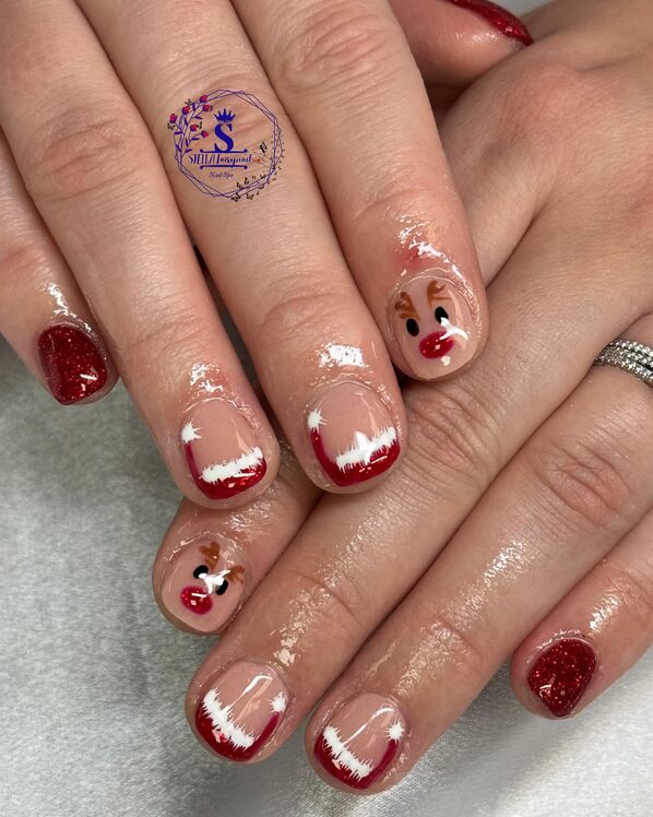 nails with reindeer accent nail featuring a red nose