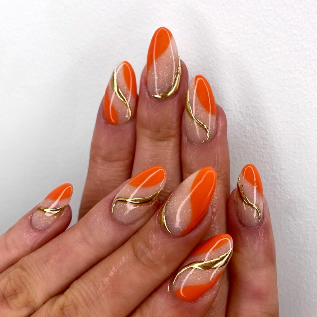 orange and gold swirl nails