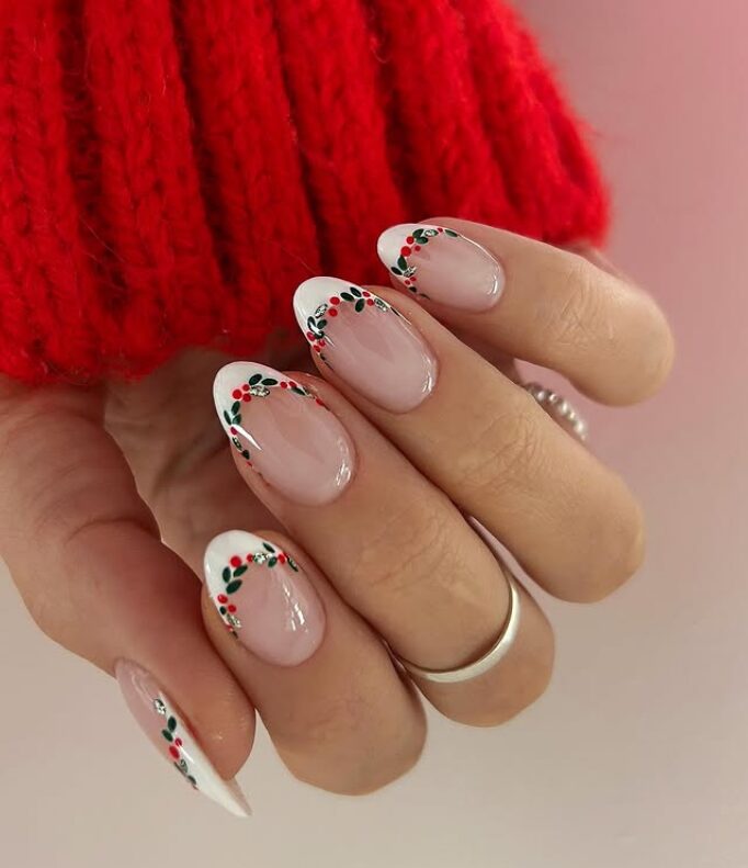White French tips with holly berry Christmas nail art