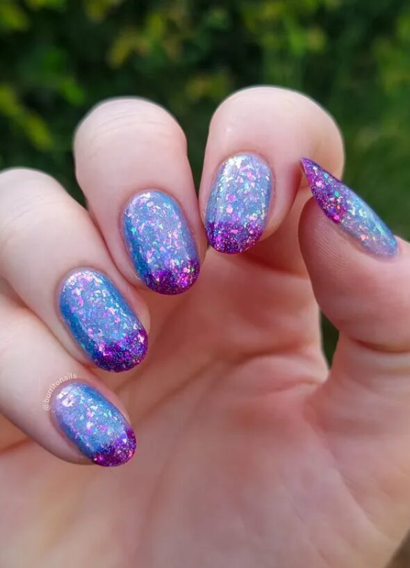 Blue-to-purple glitter ombré French tip nails