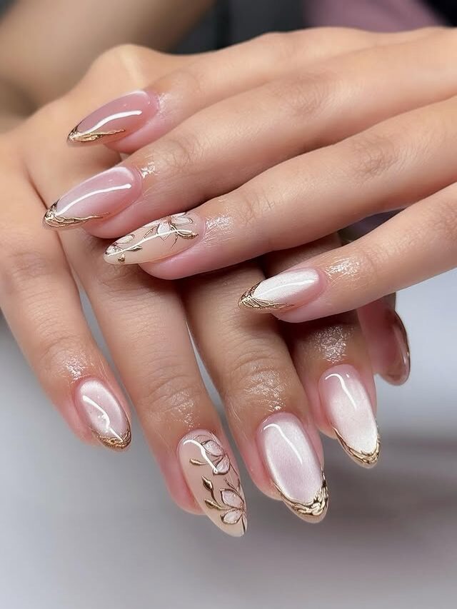 almond nails with gold outline French tips