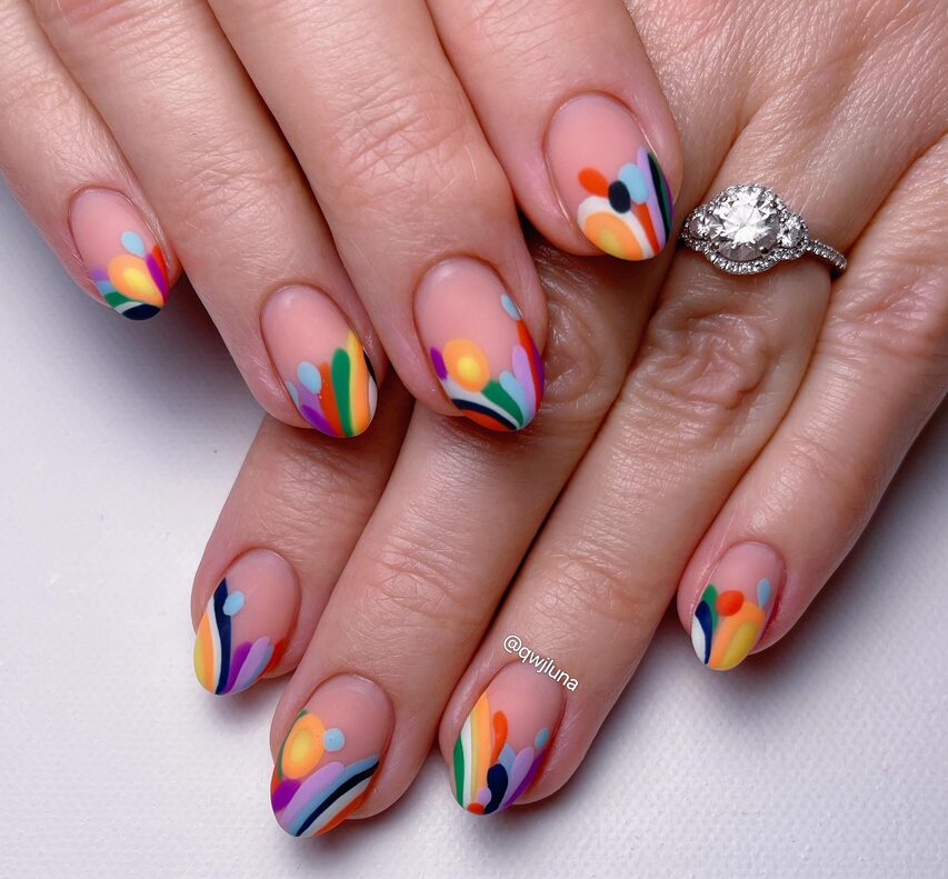 Bright multicolor abstract French tips on a nude base