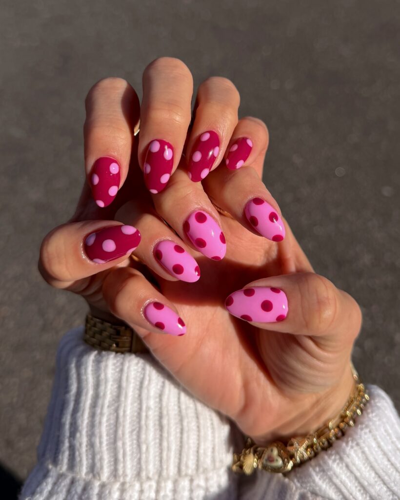Dark berry and bubblegum pink polka dot nails