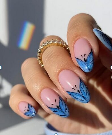nude nails with butterfly nail design on tips