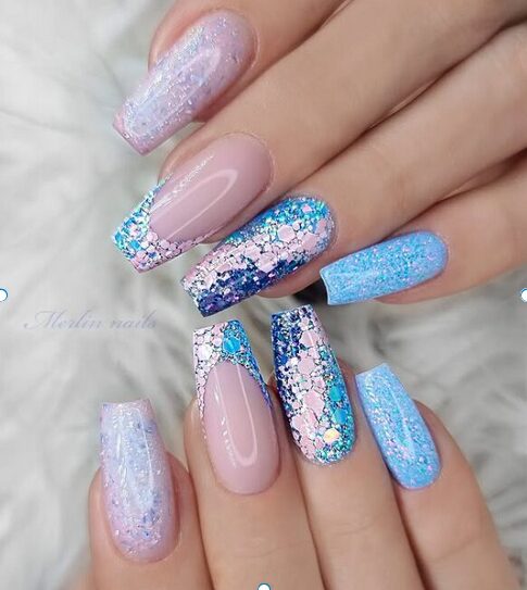 Blue and silver glitter ombre nails with nude accents