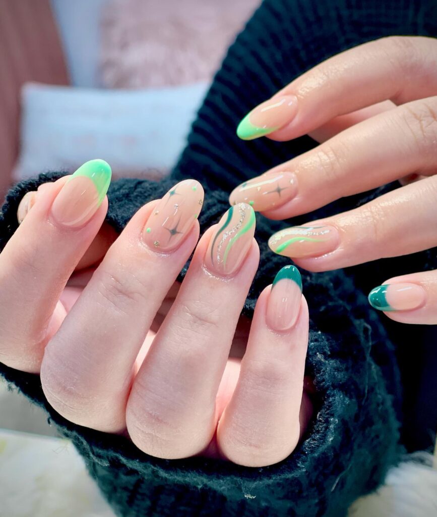 green French tips with swirl and sparkle