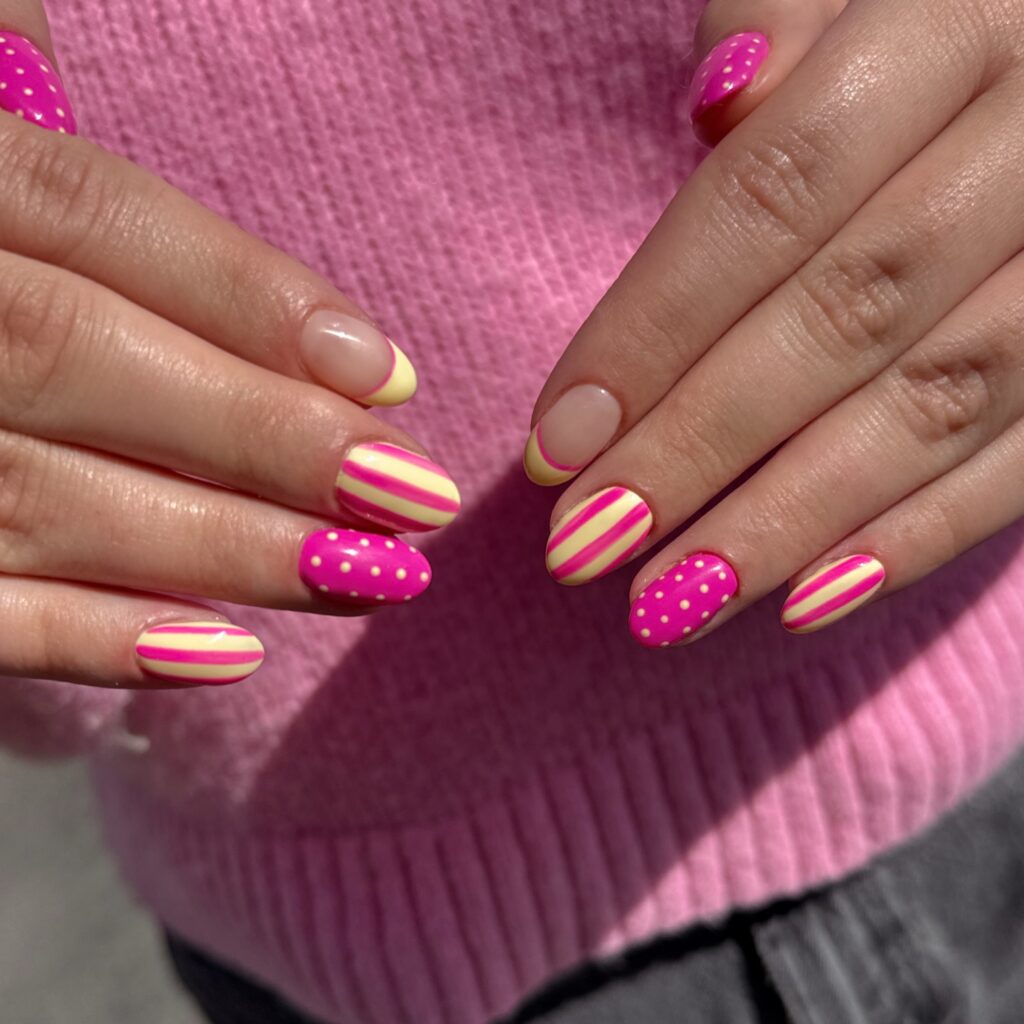 Hot pink and butter yellow stripe and polka dot nails