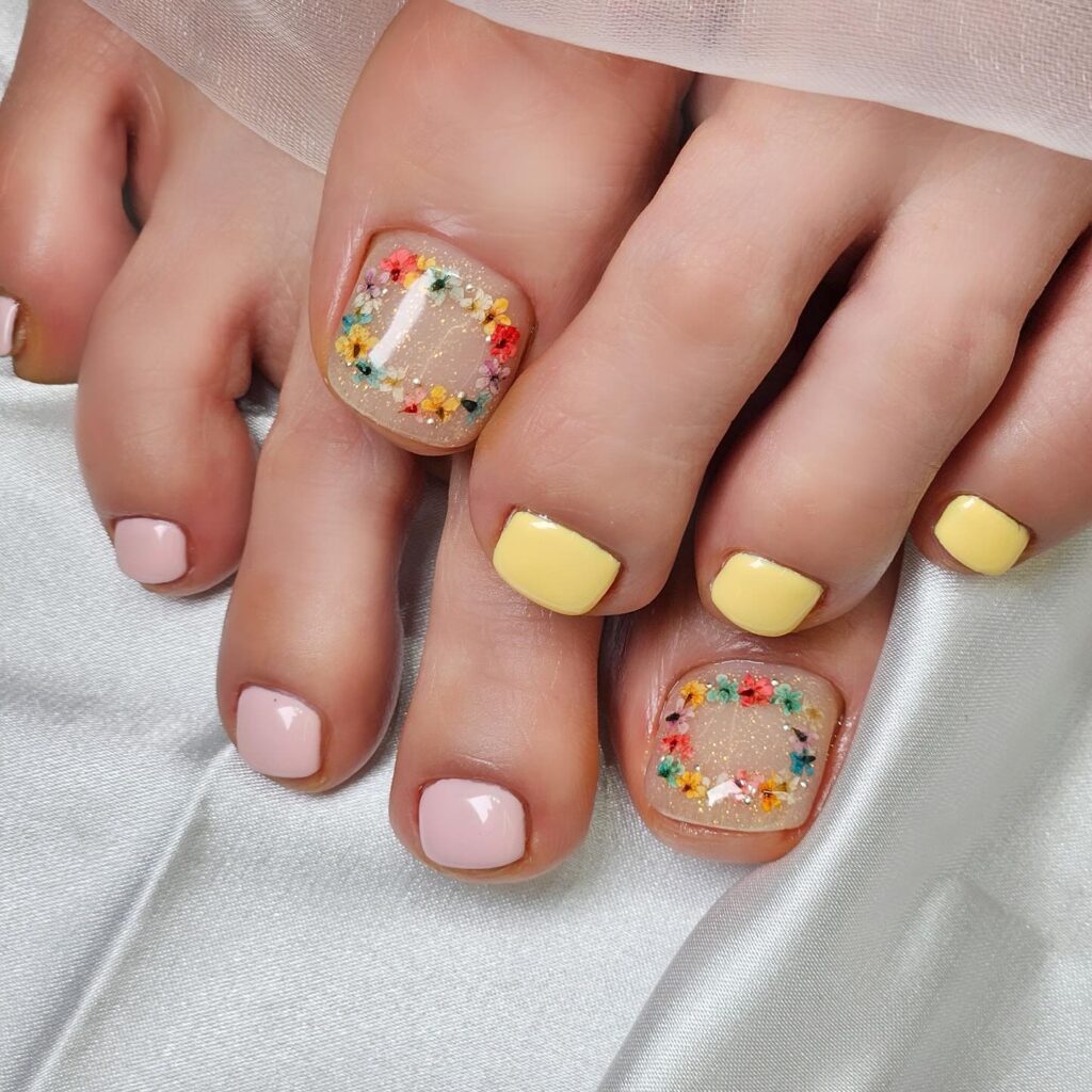 pastel spring pedicure with dried flower wreath accent