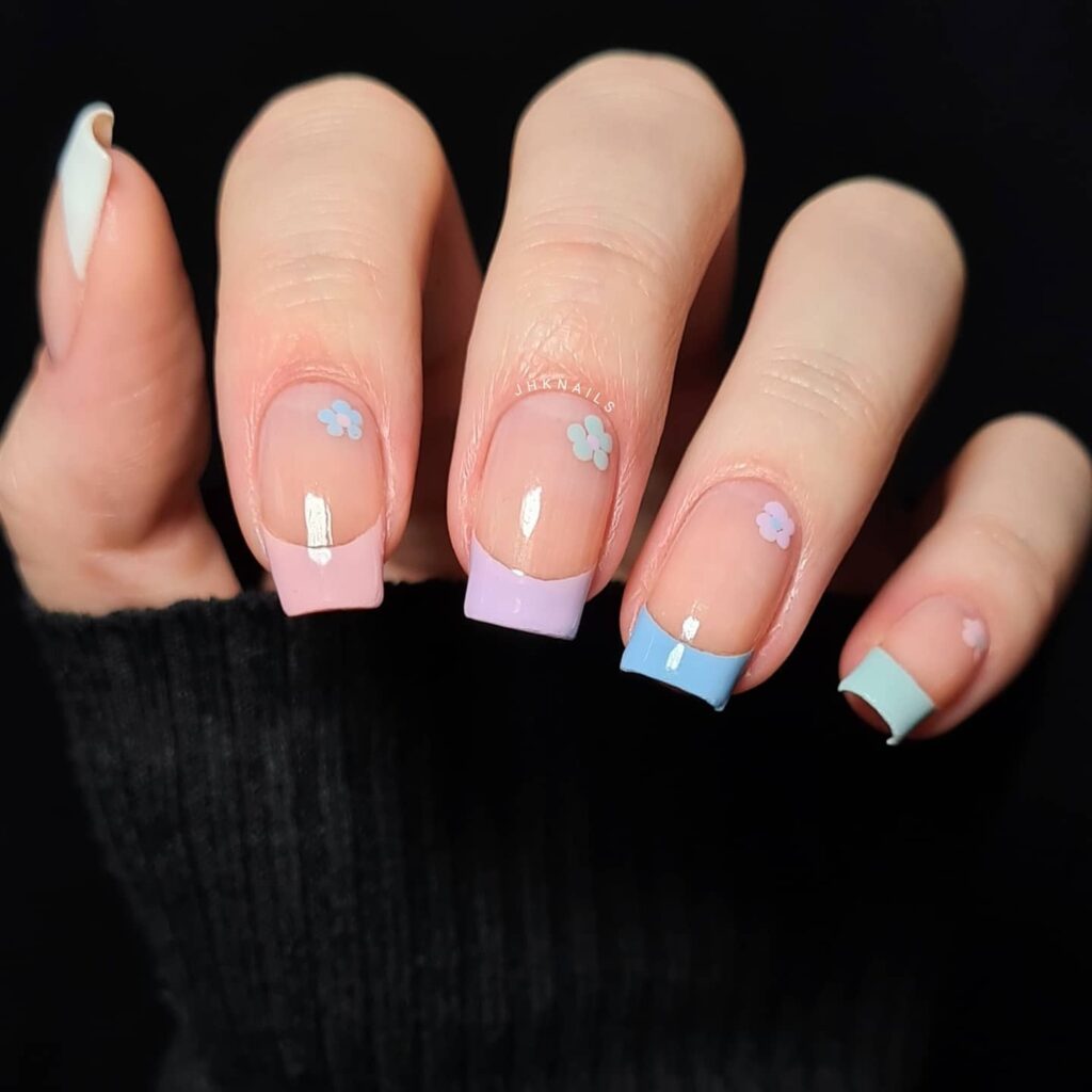 pastel rainbow French tips with flower details